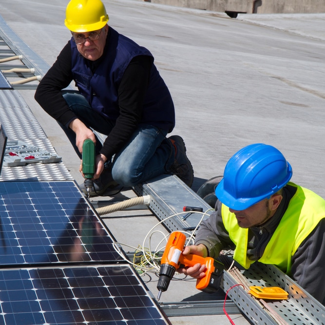 Technicians Installing Solar Panels — Plumbing in East Lismore, NSW